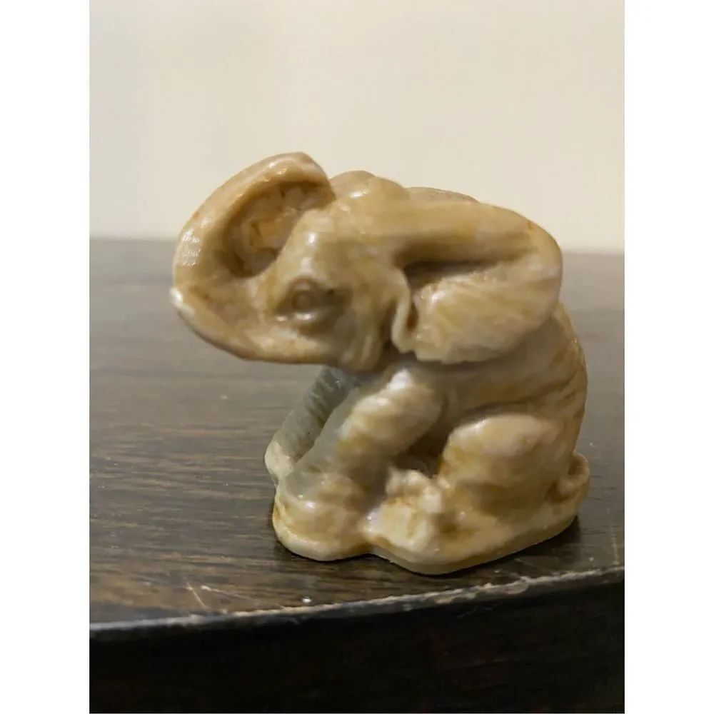 Vintage hand carved natural stone elephant figurine